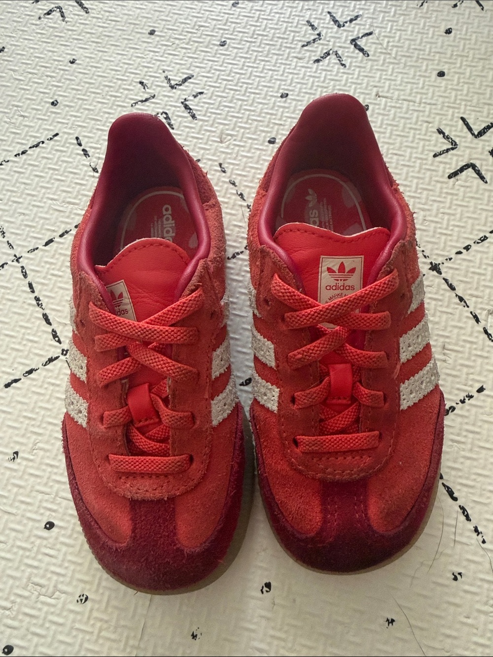 Adidas’s red sambas size 8